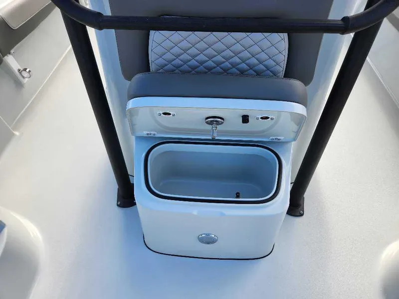 Slide: The Image of 2025 Caymas 281 HB boat interior with open storage compartment. - 7