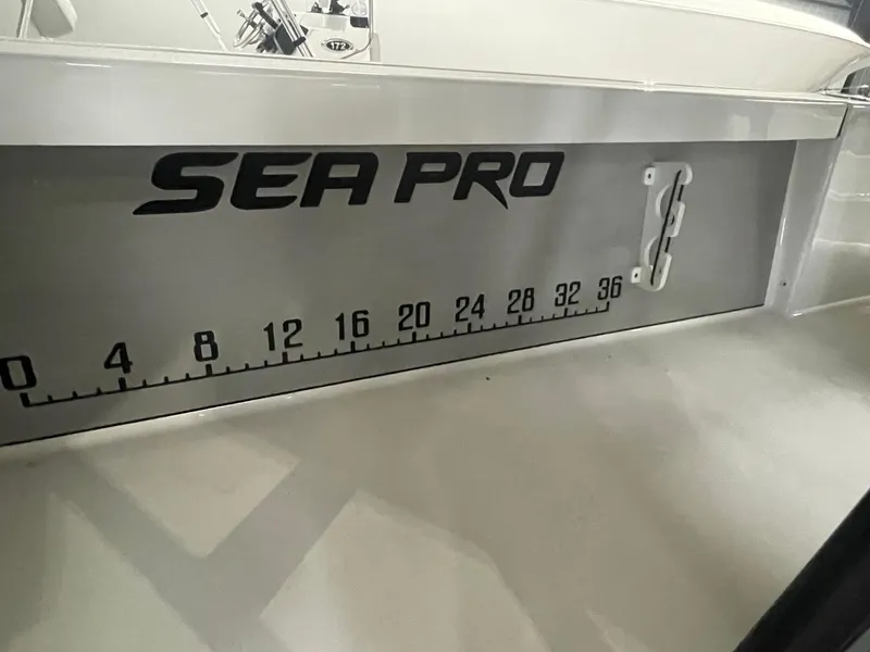 Slide: The Image of 2025 Sea Pro 230 Bay boat with built-in measuring scale on the side. - 14