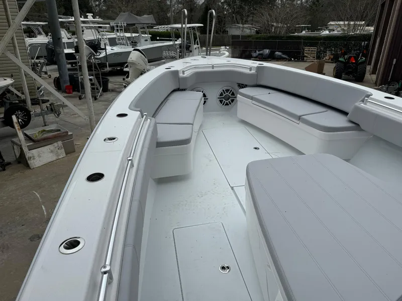 Slide: The Image of 2026 Contender 39 ST boat interior with spacious seating and sleek design. - 17