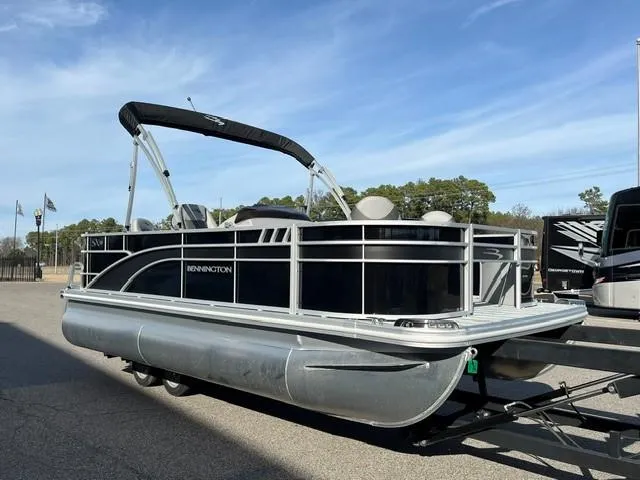 The Image of 2025 Bennington 18 SXFSE pontoon boat with canopy on a trailer. - 3