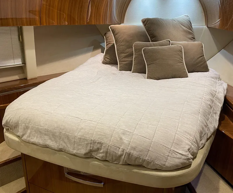 Slide: The Image of Luxurious bedroom interior of 2008 Cobalt 46 yacht with plush bedding and pillows. - 19