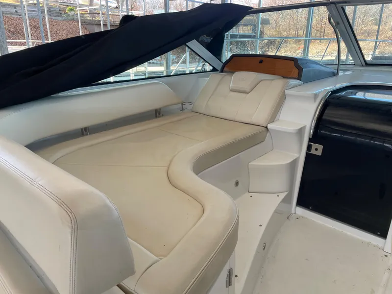 Slide: The Image of 2008 Cobalt 46 yacht interior with white leather seating and modern design. - 9