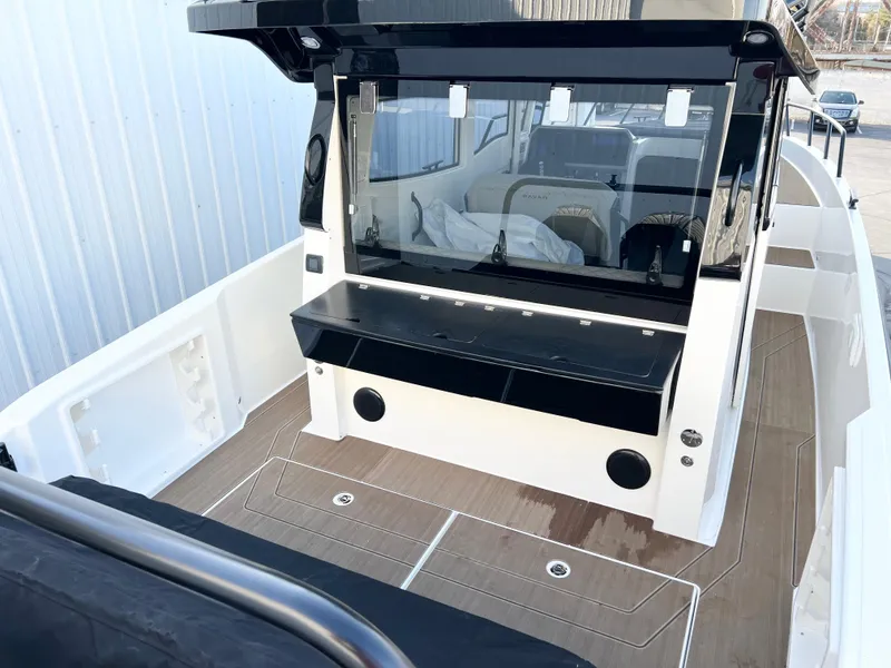 Slide: The Image of Navan C30 2025 boat with sleek deck design and modern cockpit features. - 13