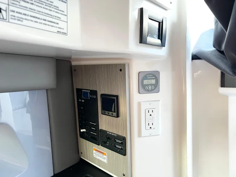 Slide: The Image of Control panel and outlets in 2025 Navan C30 interior. - 22