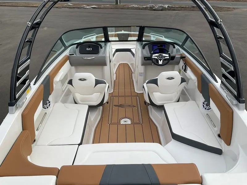 Slide: The Image of 2025 Chaparral 23 SSi boat interior with modern seating and sleek design. - 13