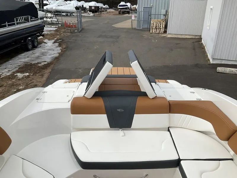 Slide: The Image of 2025 Chaparral 23 SSi boat interior with adjustable seating and modern design. - 16