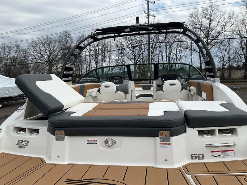 Slide: The Image of 2025 Chaparral 23 SSi boat with sleek seating and modern design. - 7