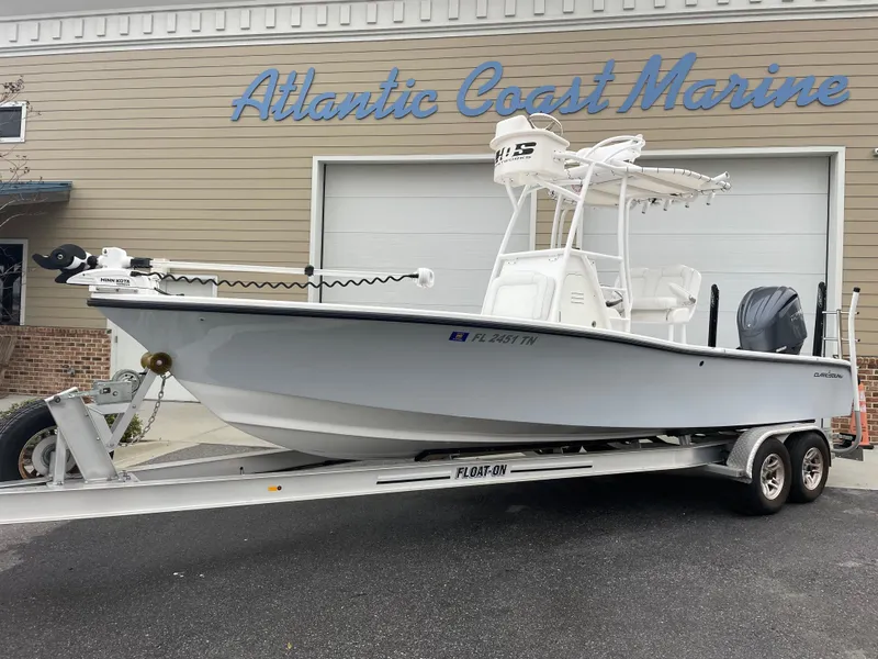 Slide: The Image of 2022 Clark Sound 24 boat on trailer at Atlantic Coast Marine dealership. - 1