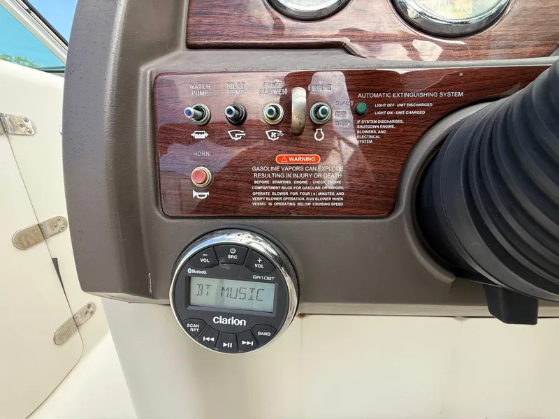 Slide: The Image of Control panel of a 2008 Sea Ray 210 Sundeck with Clarion audio system. - 45