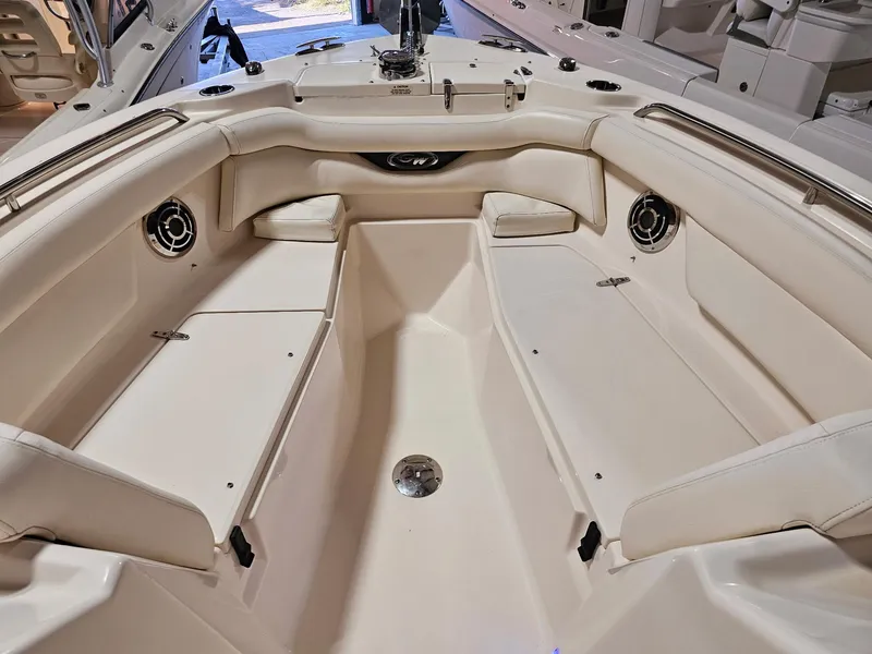 Slide: The Image of 2015 Grady-White Freedom 275 boat interior with spacious seating and modern design. - 17