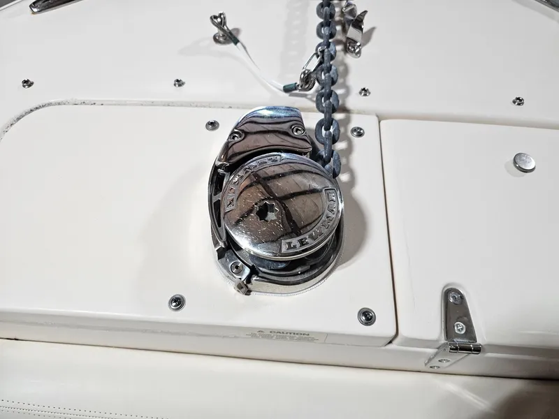 Slide: The Image of Anchor windlass on 2015 Grady-White Freedom 275 boat deck. - 19