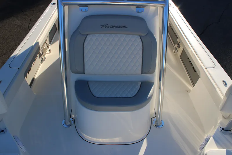 Slide: The Image of 2025 Avenger AV26 boat interior with cushioned seating and sleek design. - 17