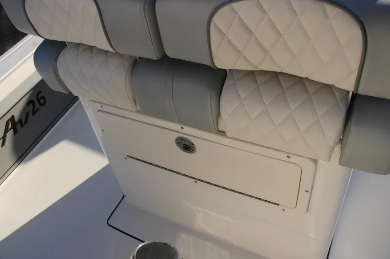 Slide: The Image of Avenger AV26 2025 boat seat with quilted upholstery and storage compartment. - 20
