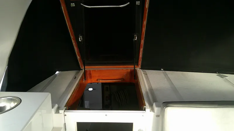 Slide: The Image of 1996 Ocean Alexander 546 Yachtfisher interior with open hatch and seating area. - 21