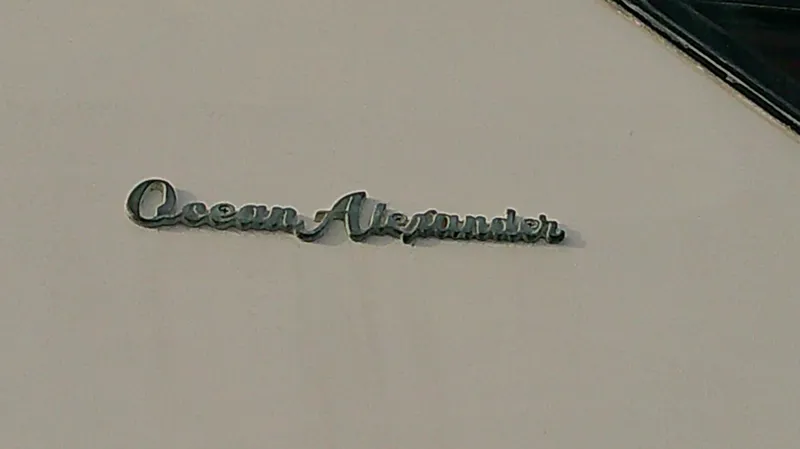 Slide: The Image of 1996 Ocean Alexander 546 Yachtfisher logo on yacht exterior. - 23
