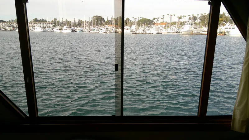 Slide: The Image of View from Ocean Alexander 546 Yachtfisher, 1996, overlooking marina and calm waters. - 30