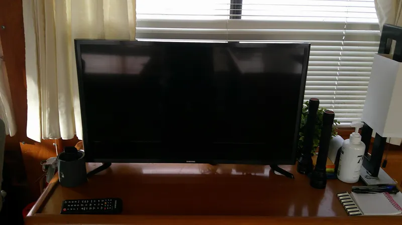 Slide: The Image of Television setup on Ocean Alexander 546 Yachtfisher, 1996 model, with remote and accessories. - 36