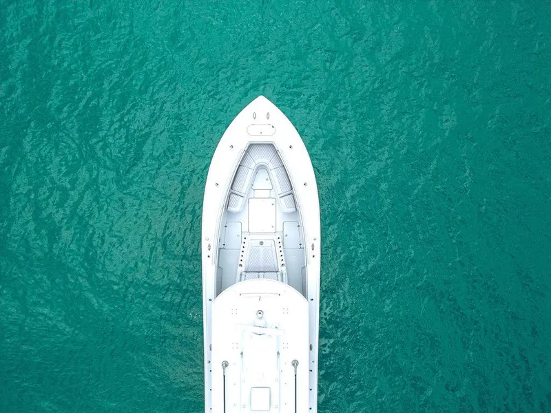 Slide: The Image of Aerial view of 2019 Yellowfin 42 boat on turquoise water. - 25