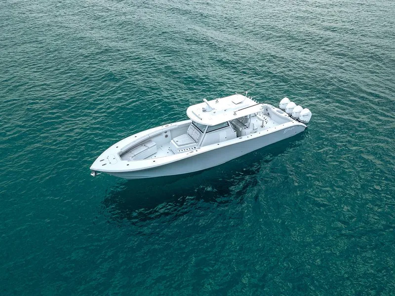 Slide: The Image of 2019 Yellowfin 42 boat on clear blue water, aerial view. - 29
