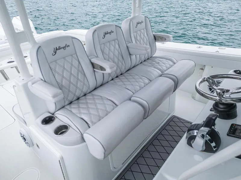 Slide: The Image of Luxurious seating on a 2019 Yellowfin 42 boat with diamond-stitched upholstery. - 38