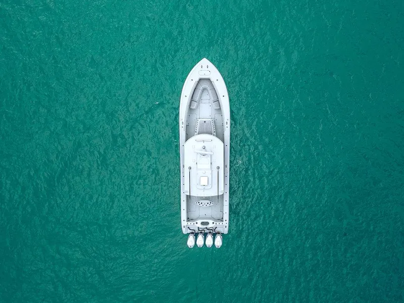 Slide: The Image of Aerial view of 2019 Yellowfin 42 boat on turquoise water. - 5