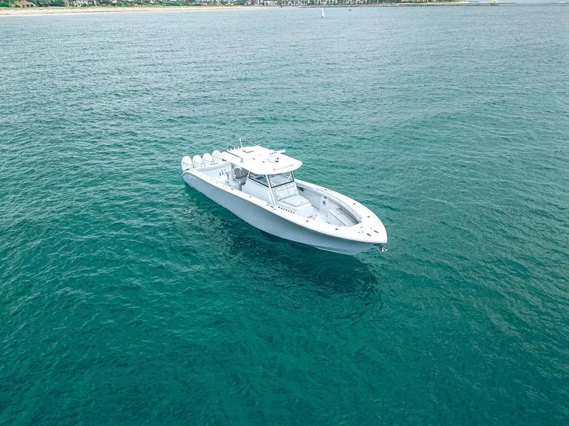 Slide: The Image of 2019 Yellowfin 42 boat on open water, aerial view. - 6