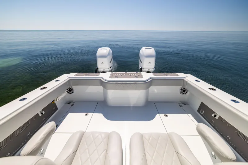 Slide: The Image of Freeman 34VH 2022 boat with dual engines on calm sea. - 20