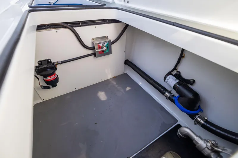 Slide: The Image of Freeman 34VH 2022 boat compartment with wiring and plumbing details. - 22