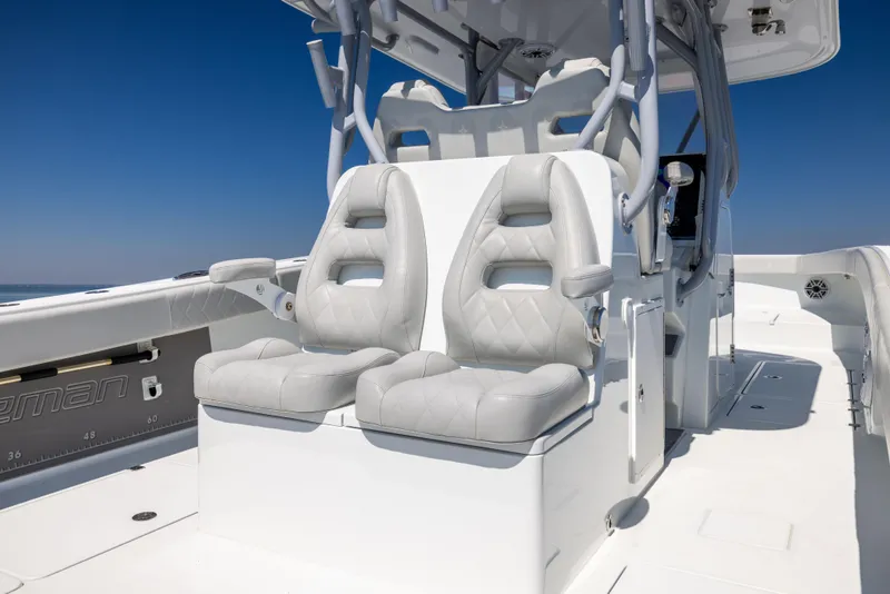 Slide: The Image of Luxury seating on 2022 Freeman 34VH boat, featuring modern design and comfort. - 26