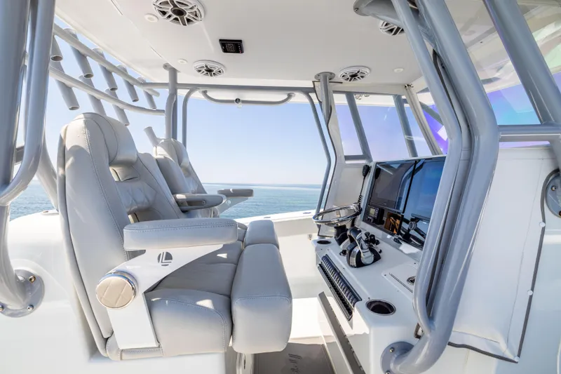 Slide: The Image of Interior of 2022 Freeman 34VH boat with modern helm and seating. - 30