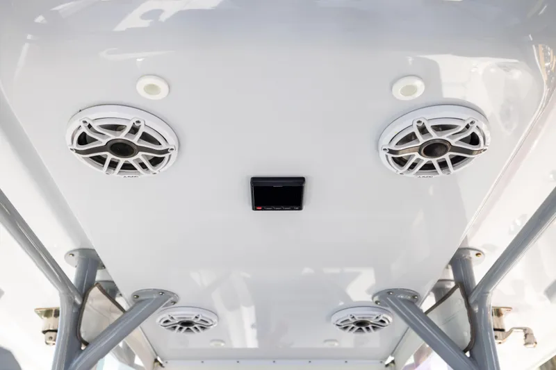 Slide: The Image of Freeman 34VH 2022 boat ceiling with speakers and lighting fixtures. - 34