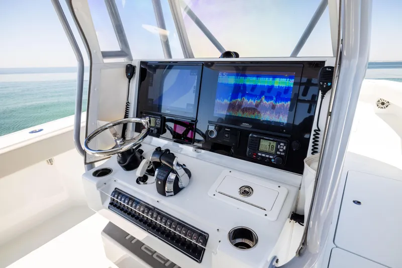 Slide: The Image of Freeman 34VH 2022 boat dashboard with advanced navigation and control systems. - 35