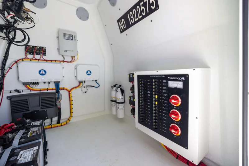 Slide: The Image of Electrical panel inside Freeman 34VH boat, 2022 model, with wiring and equipment. - 38
