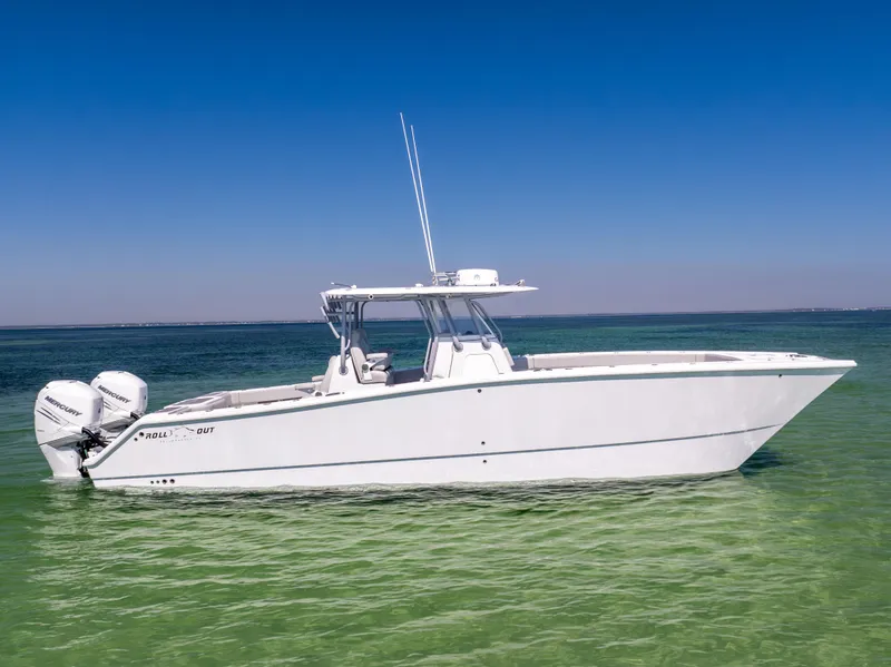 Slide: The Image of Freeman 34VH 2022 boat on clear water under blue sky. - 4