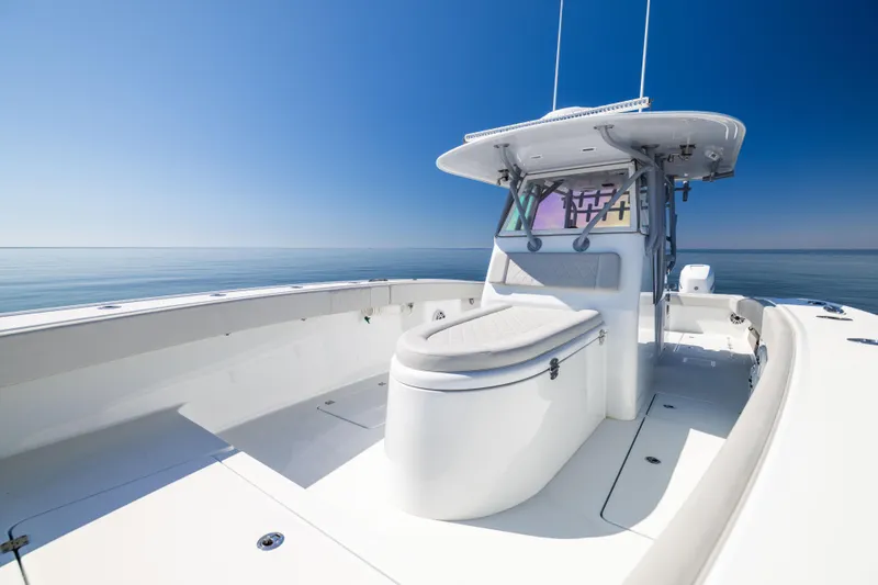 Slide: The Image of 2022 Freeman 34VH boat on calm ocean under clear blue sky. - 44