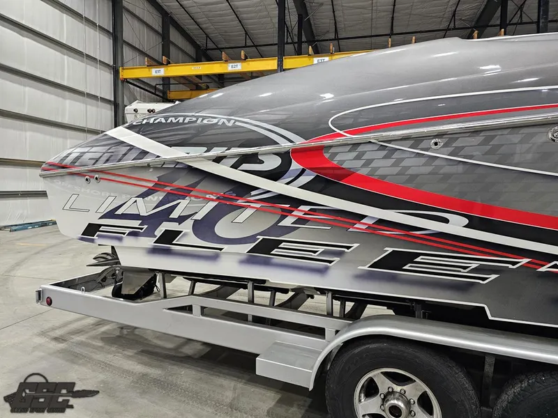 Slide: The Image of 2006 Outerlimits 46 Limited speedboat on trailer in warehouse. - 12