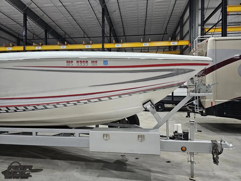 Slide: The Image of 2006 Outerlimits 46 Limited boat on trailer in storage facility. - 19