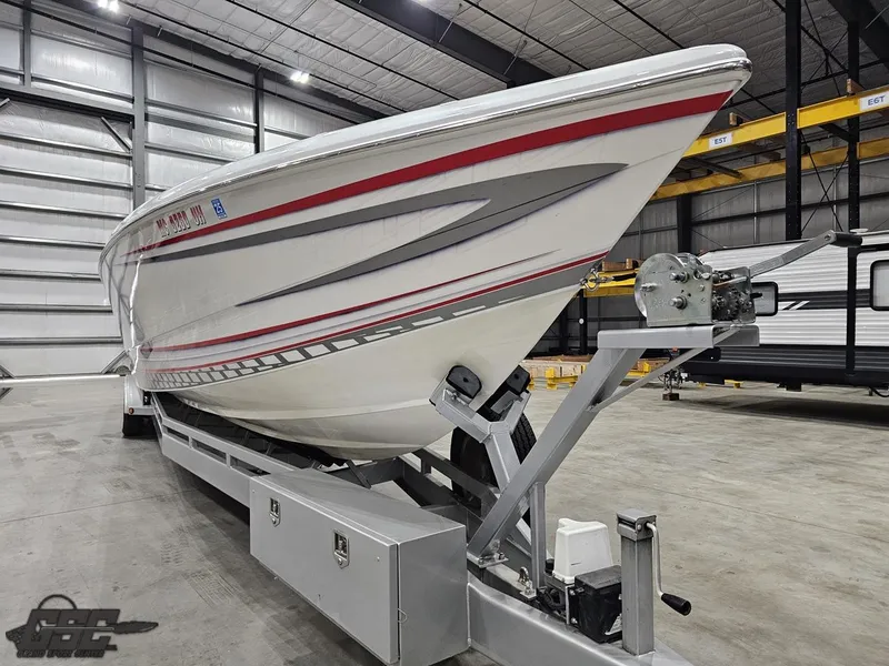 Slide: The Image of 2006 Outerlimits 46 Limited boat on trailer in indoor storage facility. - 20