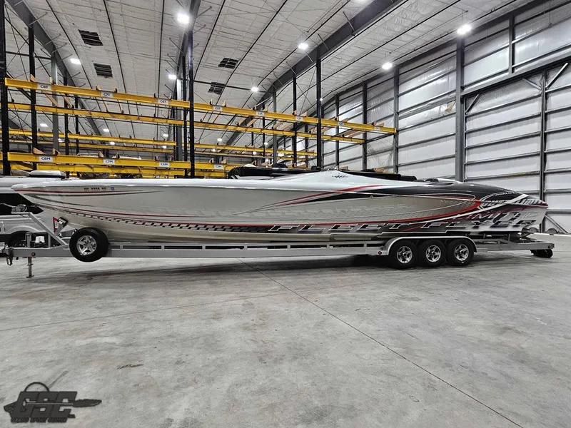 Slide: The Image of 2006 Outerlimits 46 Limited boat in a spacious indoor storage facility. - 23