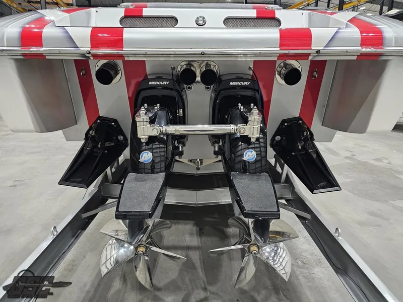 Slide: The Image of 2006 Outerlimits 46 Limited boat with dual Mercury engines and propellers. - 34