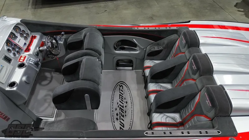 Slide: The Image of 2006 Outerlimits 46 Limited boat interior with sleek seating and modern dashboard design. - 41