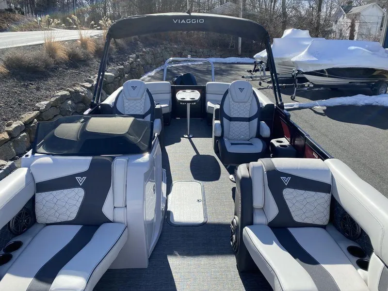 Slide: The Image of 2024 Viaggio Diamante D22U Triple pontoon boat with luxurious seating and modern design. - 10