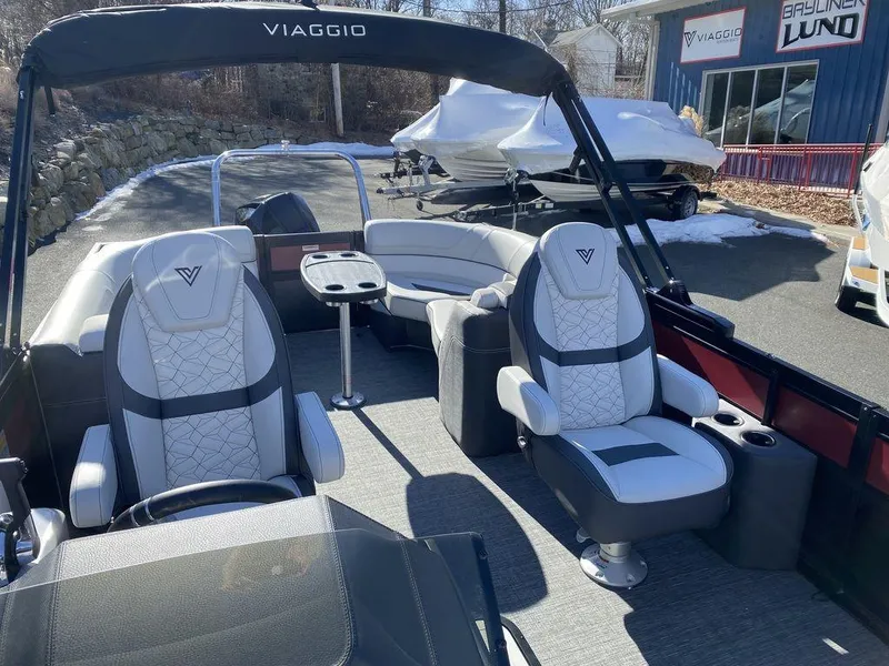 Slide: The Image of 2024 Viaggio Diamante D22U Triple pontoon boat with luxurious seating and modern design. - 16