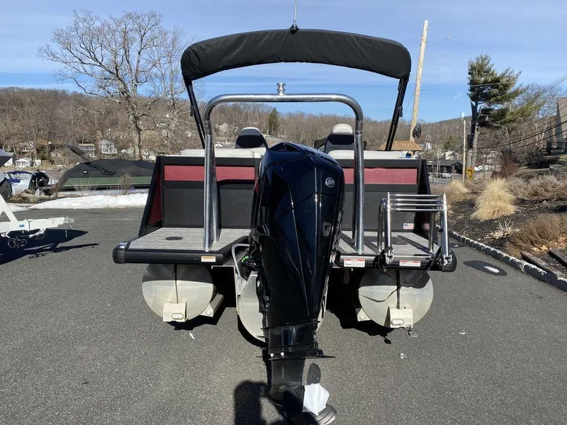 Slide: The Image of 2024 Viaggio Diamante D22U Triple pontoon boat with outboard motor, rear view. - 4