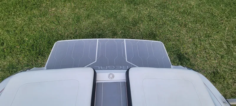 Slide: The Image of 2021 Regal LS2 boat deck on grass background. - 30