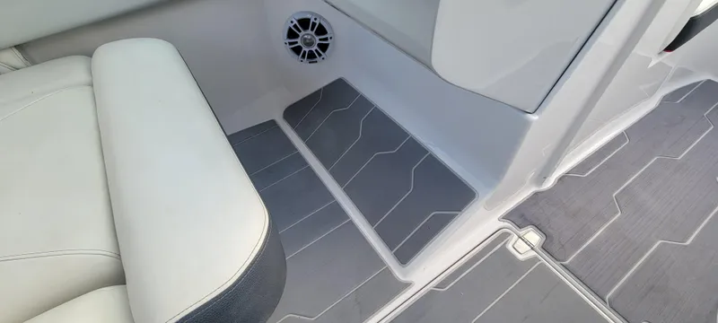 Slide: The Image of Interior of 2021 Regal LS2 boat with sleek seating and modern flooring design. - 37