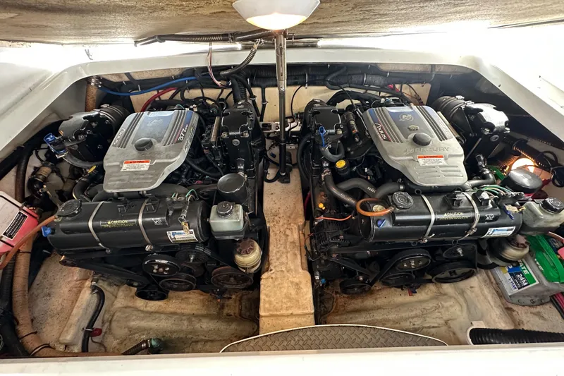 Slide: The Image of 2009 Formula 310 Bowrider engine compartment with dual engines. - 13