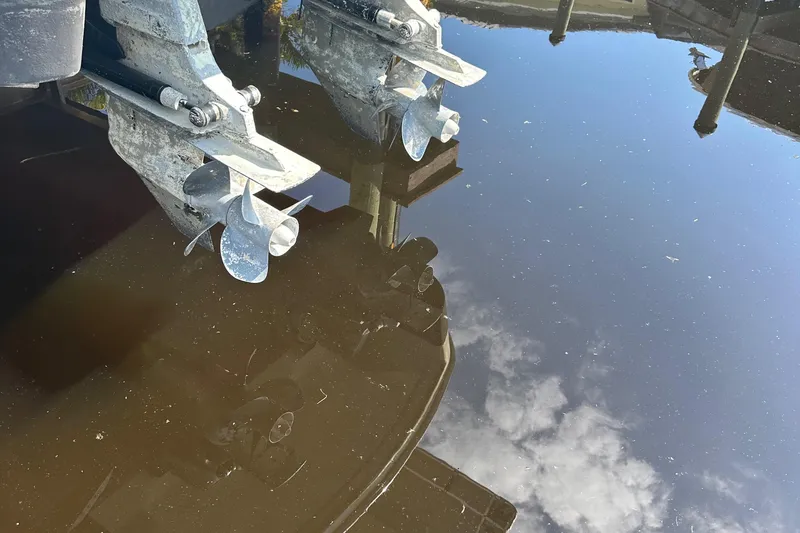 Slide: The Image of Propellers of a 2009 Formula 310 Bowrider boat reflected in calm water. - 14