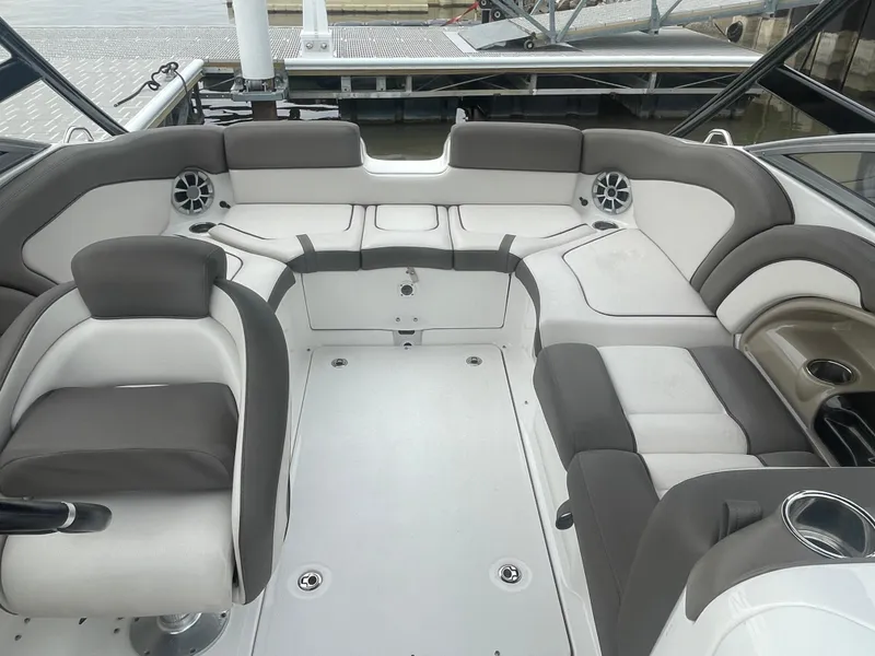 Slide: The Image of 2020 Yamaha Boats 242 Limited S interior with spacious seating and modern design. - 16