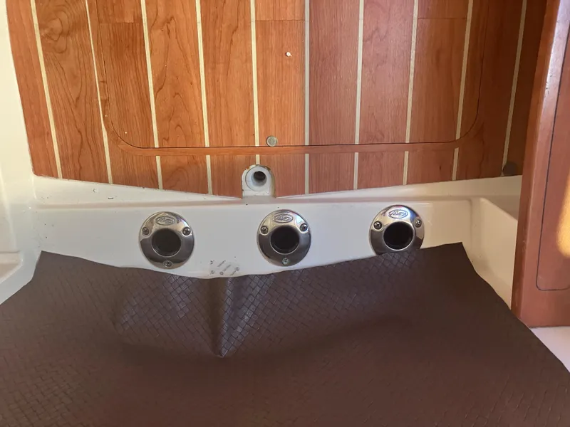 Slide: The Image of Interior view of 2020 Grady-White Canyon 336 boat with wood paneling and fixtures. - 38